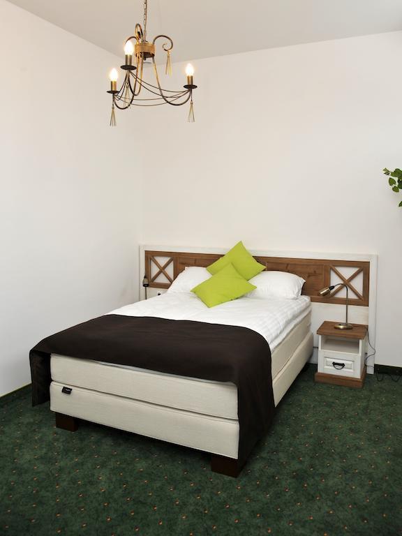 Hotel Sandro Silver & Spichlerz Antoniny レシュノ 部屋 写真